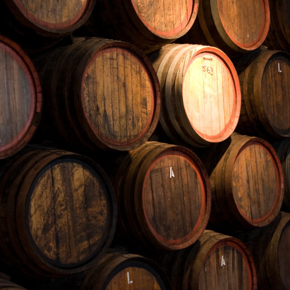 a pile of whisky barrels
