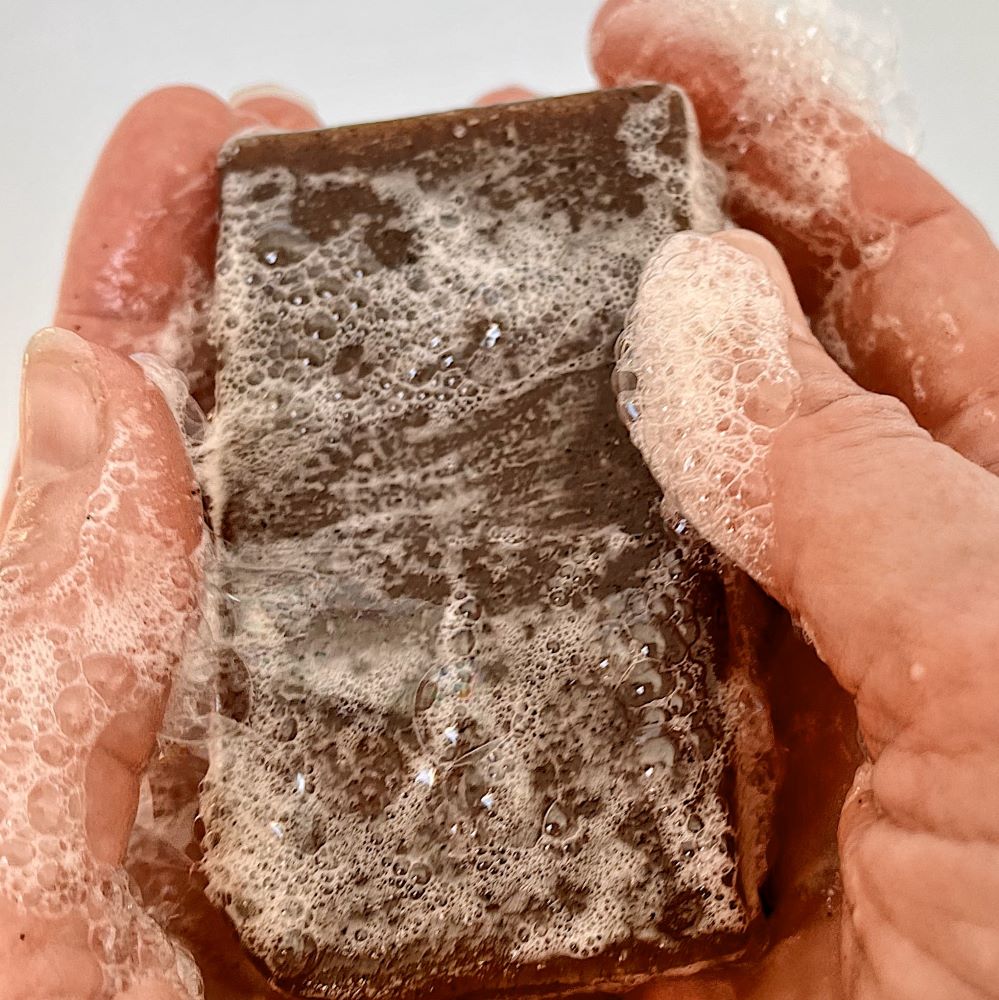 Hand washing with exfoliating hand soap