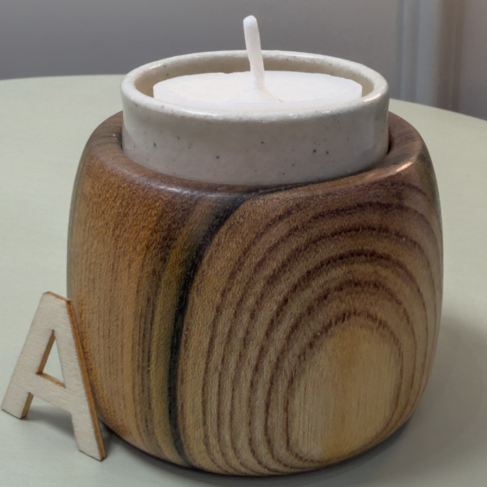 Scottish Elm locally sourced Elm turned into a tealight holder with a cute ceramic insert cup
