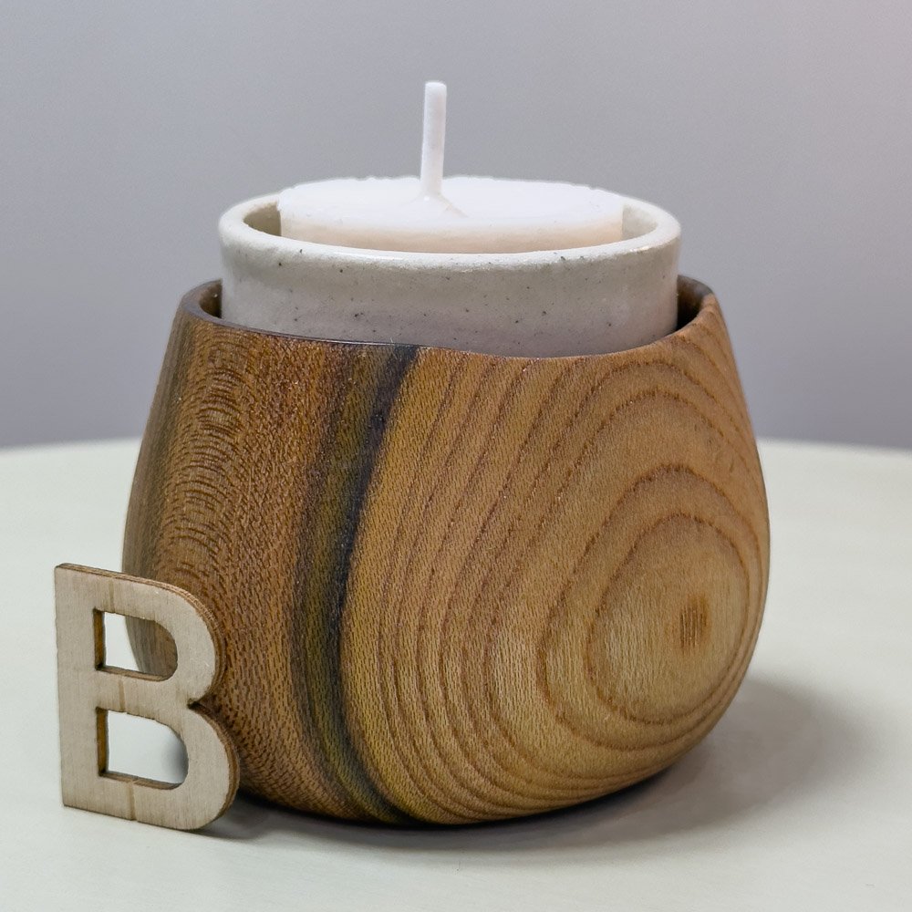 Scottish Elm locally sourced Elm turned into a tealight holder with a cute ceramic insert cup