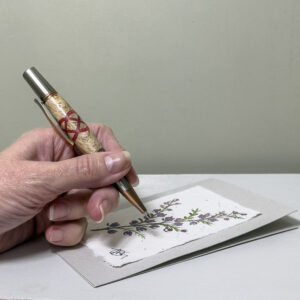 Double infinity knot pen