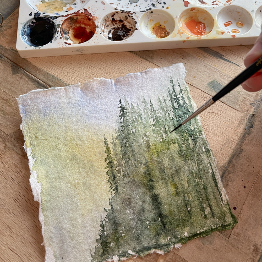 Shaun McKay painting a Scottish Landscape in Watercolours using Winsor & Newton Professional watercolour paints and a Princeton Brush on handmade cotton rag paper
