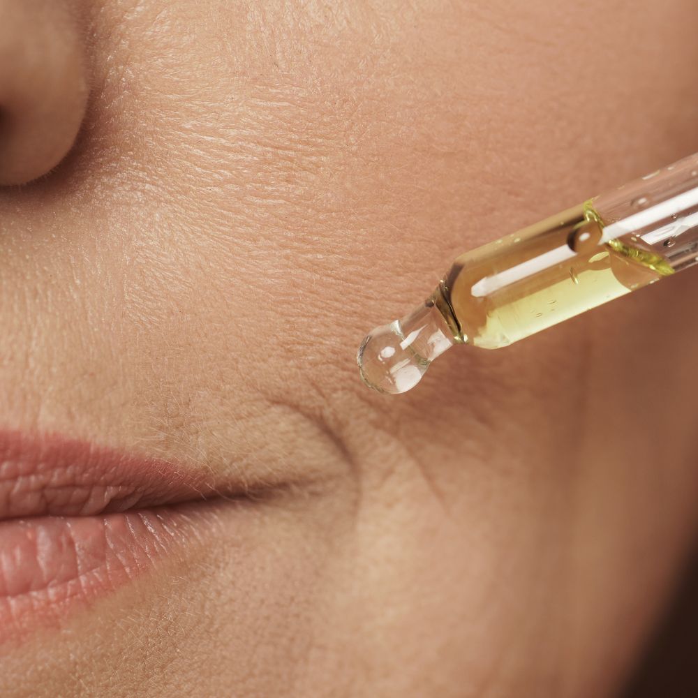 restore facial oil full of antioxidants and nutrients being used on the face
