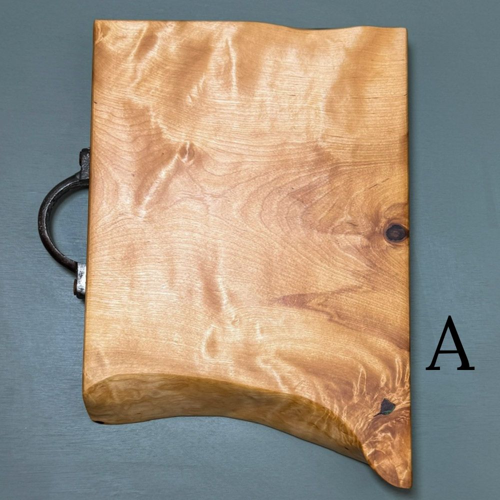 Highland Birch Serving Board with a live edge and reclaimed cast iron handle high chatoyancy Board A
