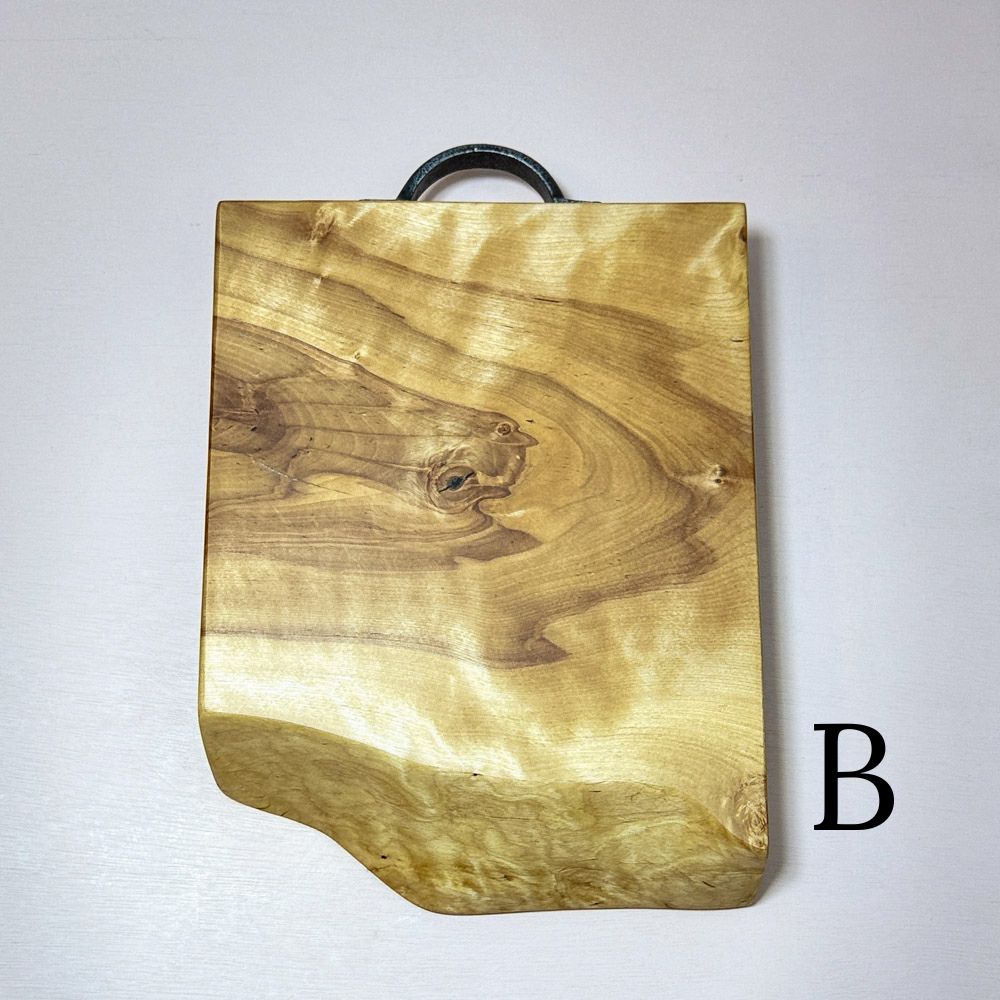 Highland Birch Serving Board with a live edge and reclaimed cast iron handle high chatoyancy Board B