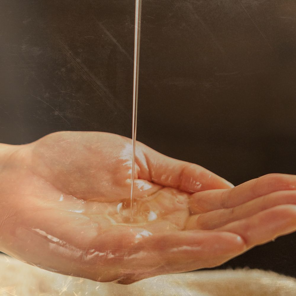 Oil cleansing is a good way to support the stratum corneum or the skin barrier this image shows oil being poured onto palms