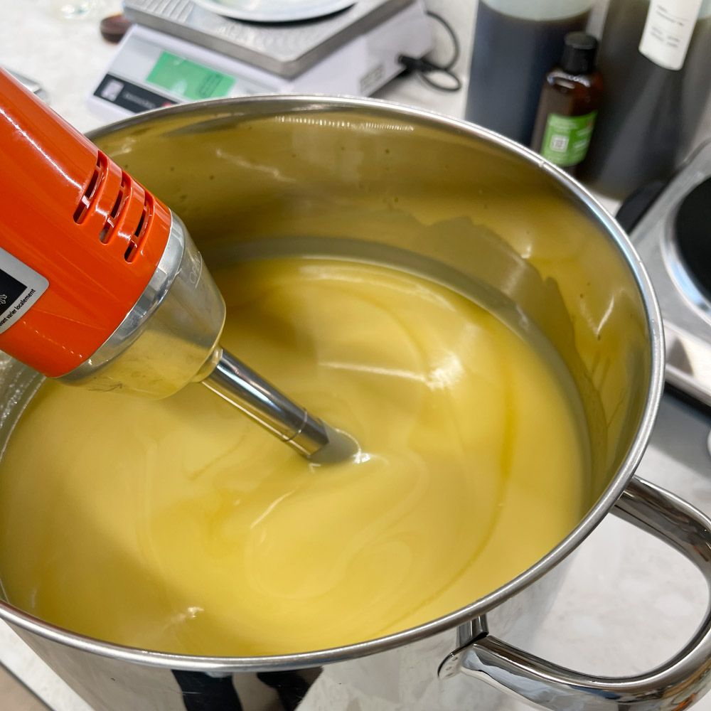 mixing the soap mixture prior to pouring using a heavy duty hand blender