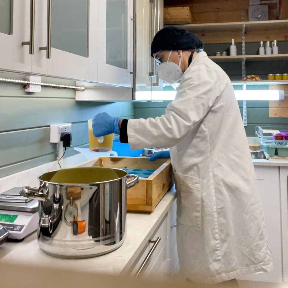 Pouring the shampoo into moulds