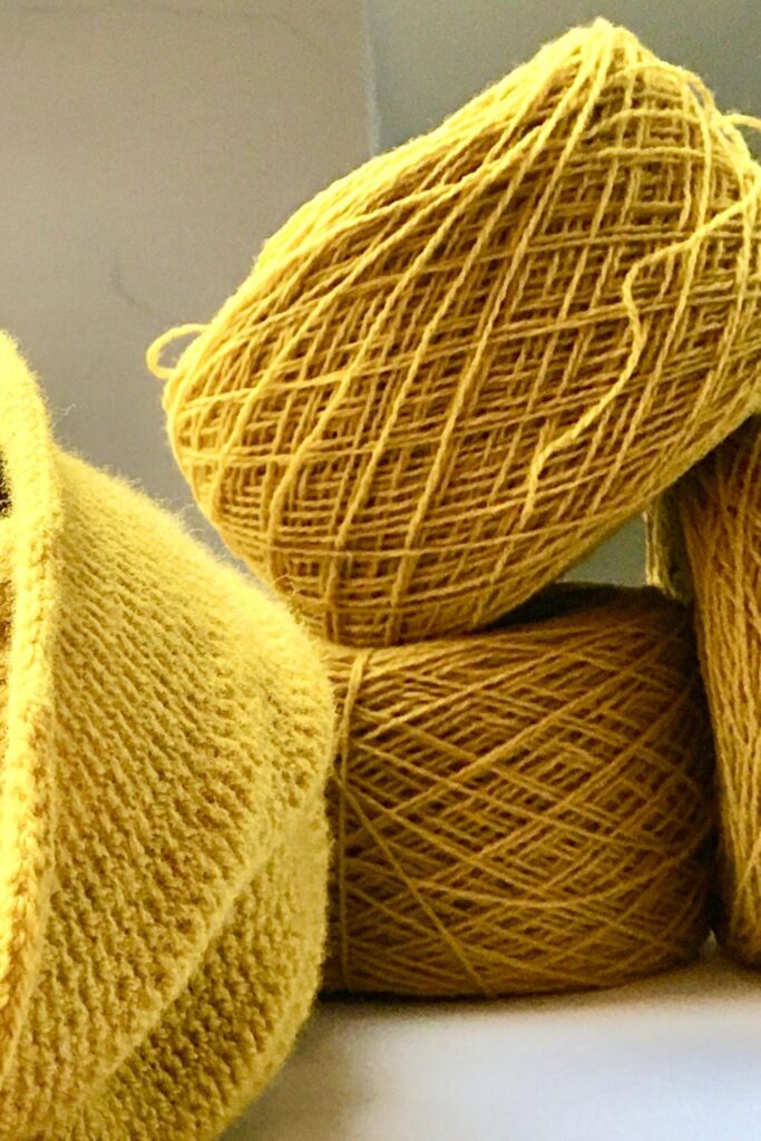 a ball of yellow scottish lambswool by todd * duncan that will be made into an infinity scarf at Made in the Glen