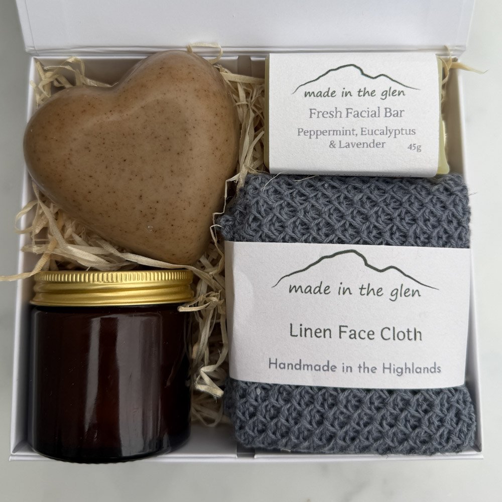 White Highland gift box with hand-painted Loch Dochfour artwork by Julia ann, including candle soaps and linen face cloth
