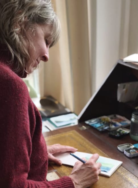 Julia Anne Gibson at her Art desk in Made in the Glen